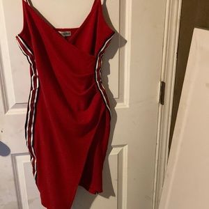 Pretty red crossover dress with detailing on the side  with red,white and black.